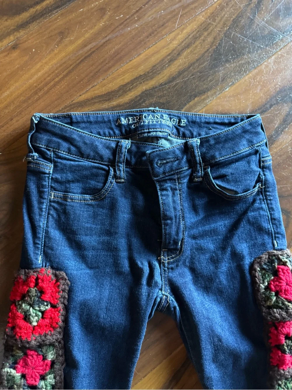 Upcycled dark wash capris with granny squares added - Picture 2 of 7